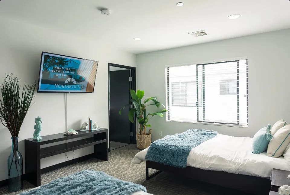 Private residential bedroom at The Grove — Northbound's Garden Grove campus, prepared for a comfortable start to recovery.