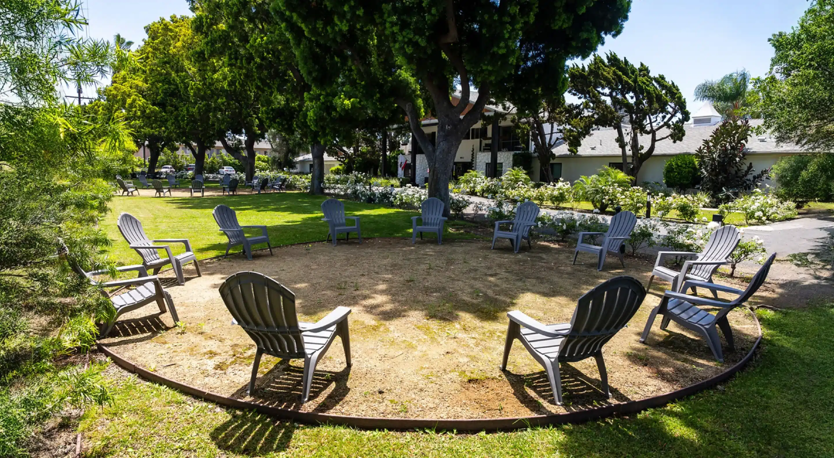 Outdoor meditation circle on the lawn at Northbound's Garden Grove campus — The Grove
