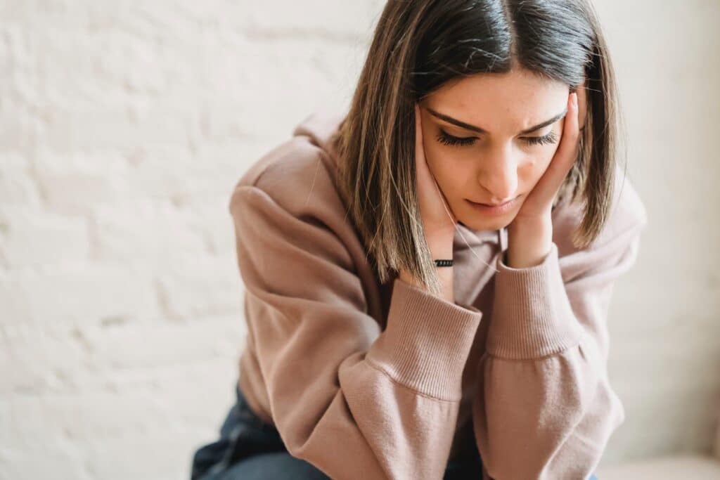 A woman deep in thought