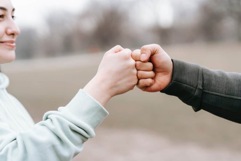 fist bumping